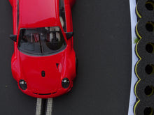 Laden Sie das Bild in den Galerie-Viewer, NSR Porsche 997 neben Reifenstapel Modellbau schwarz gelb - Alternative zu carrera 21130 carrera digital