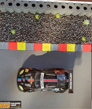 Laden Sie das Bild in den Galerie-Viewer, Modellbau Diarama Curbs gelb rot schwarz mit Reifenstapel RAS und NSR Aston Martin Martini #69